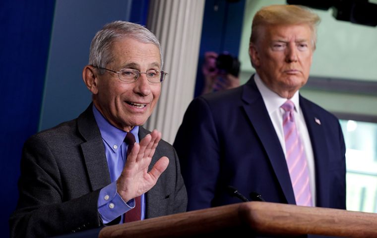 At a briefing Trump said he and Fauci had been on the same page “from the beginning” about the virus