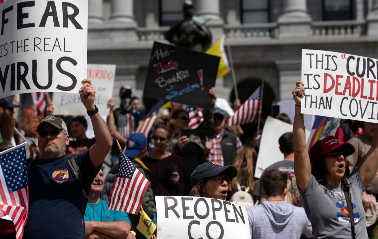 Crowds remained on the capitol grounds after the scheduled finish of the rally, but Washington state police did not issue any citations, said spokesman Chris Loftis.