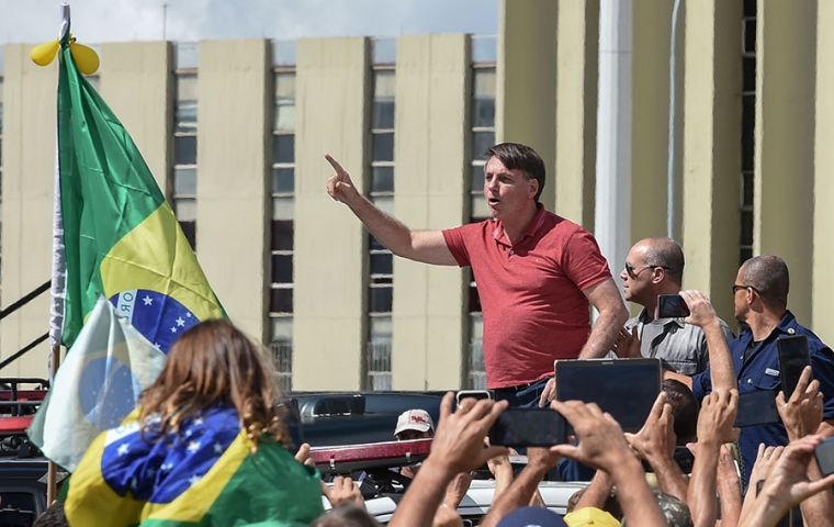 Bolsonaro on the army truck firing up protestors