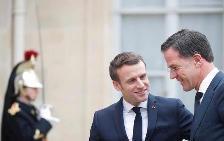 Emmanuel Macron welcomes Dutch Prime Minister Mark Rutte for a working lunch at the Elysee Palace in Paris in February. REUTERS