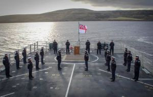 Falklands' patrol HMS Forth, offshore in San Carlos waters, also conducted a service. (Pic BFSAI)