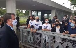 Bolsonaro has made a habit of stopping at the residence's entrance to speak to cheering supporters, take selfies with them and make comments to the journalists.