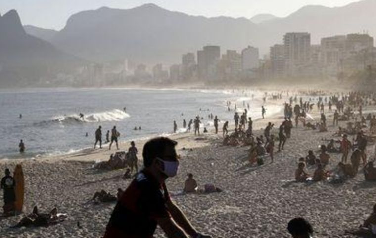 On Sunday, swimmers and sunbathers packed Rio's with many neither wearing masks nor respecting WHO's social distance guidance 