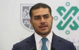 The city's public security chief Omar Garcia Harfuch suffered three bullet wounds when he and bodyguards were attacked in an upscale Mexico City neighborhood