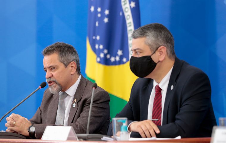 Elcio Franco (left) said the country will initially produce some 30 million doses of the vaccine, half by December and half by January of next year.