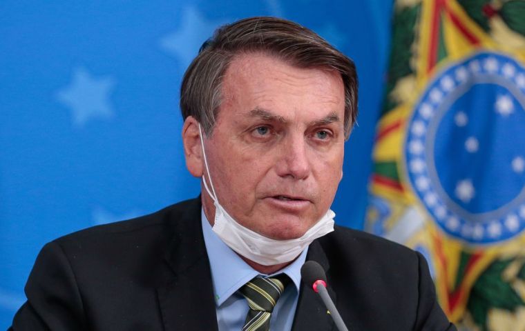 Bolsonaro told supporters outside the presidential palace that he had just visited the hospital and been tested for the virus, adding that an exam had shown his lungs were “clean.”