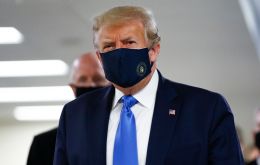 The visit to Walter Reed National Military Medical Center marked Trump's first public appearance with a face covering since the virus began sweeping the US