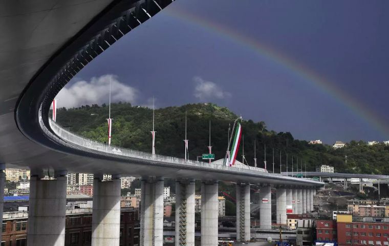 As a rainbow appeared in the sky, PM Giuseppe Conte cut the ribbon on the new bridge, designed by famed Italian architect Renzo Piano