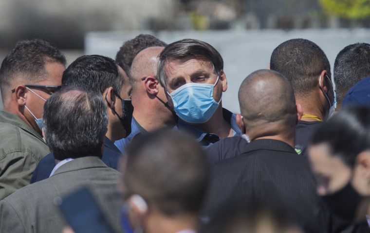 The reporter was part of a group that met Bolsonaro after his regular Sunday visit to the Metropolitan Cathedral in Brasilia