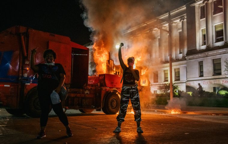 Officials were preparing for a repeat of Monday night when smoke billowed over central Kenosha and police in riot gear clashed with protesters who defied a dusk-to-dawn curfew