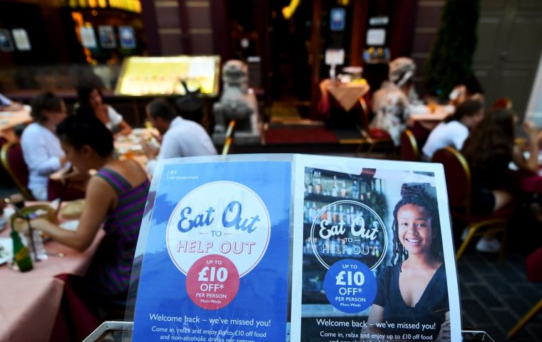 The program offered 50% off the price of meals on the first three days of the week at restaurants, up to a max of £10, with government making up the difference.