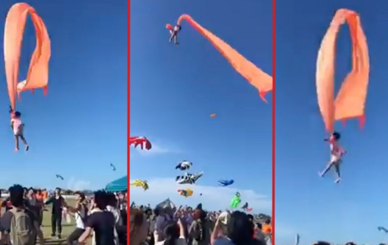 It took some 30 seconds before the girl’s nightmare ended and she was pulled back to the ground by members of the crowd as the kite was brought under control 