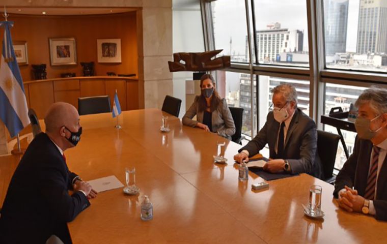 UK ambassador Mark Kent, left, with Argentine foreign minister Felipe Solá and his support staff, Daniel Filmus and Sandra Pitta during the exchange of notes 