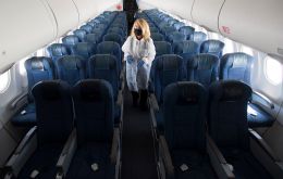 When a seated passenger is wearing a mask, an average 0.003% of air particles within the breathing zone around a person's head are infectious