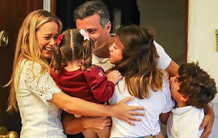López tweeted “we'll continue working day and night to attain the freedom that we Venezuelans all deserve” and on Sunday he published a photo with his wife Lilian Tintori in Madrid.