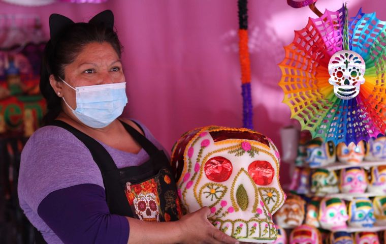 Mexico's Day of the Dead festival blends Catholic rituals with the pre-Hispanic belief that the dead return once a year from the underworld