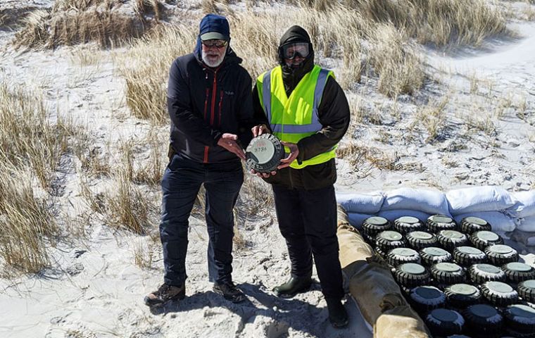 Guy Marot of Fenix Insight and John Hare of SafeLane Global holding the last mine removed from the ground and which will be detonated this Saturday in a special celebration (Pics G. Marot)