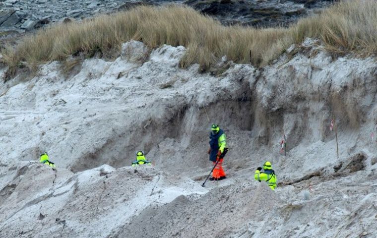A team of Zimbabweans working in the clearance of mines in the Falklands. Unearthing 20,000 antipersonnel and 5,000 mines took eleven years 