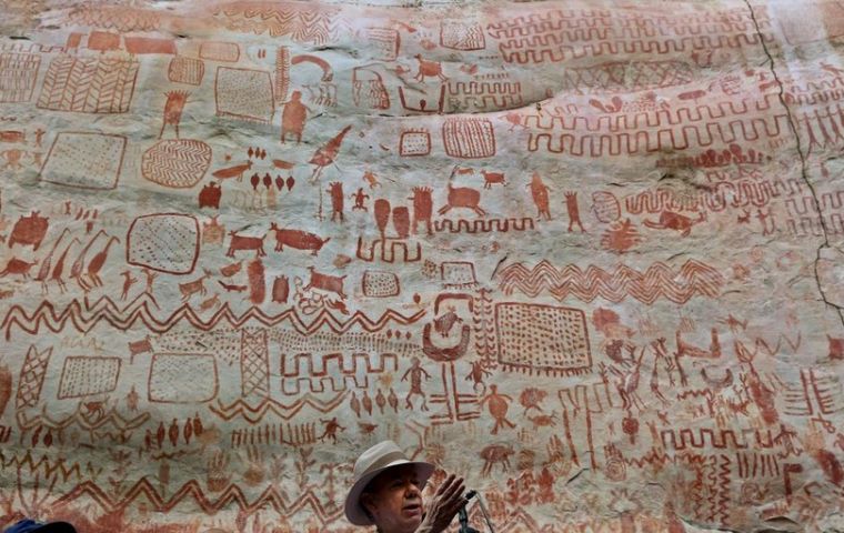 The eight-mile wall of art was created by the first humans of the Amazon some 12,500 years ago