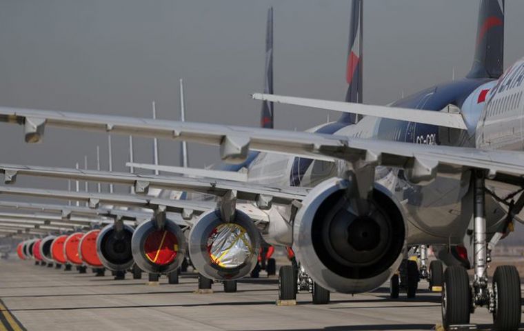 LATAM aircraft lined up at Santiago's main airport. REUTERS/Ivan Alvarado