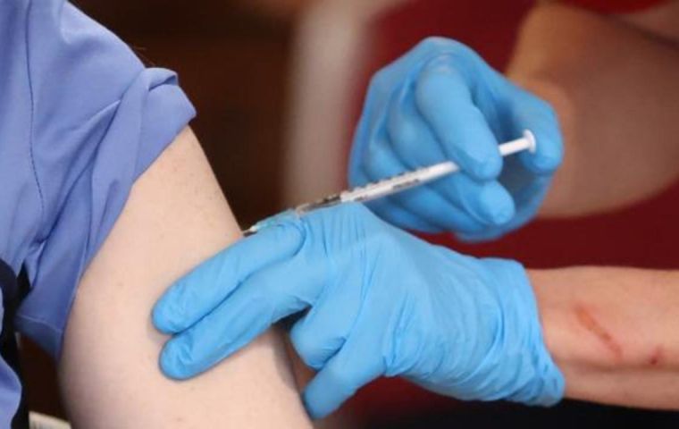 NHS medical director Stephen Powis said the advice had been changed after two NHS workers reported anaphylactoid reactions associated with the vaccine