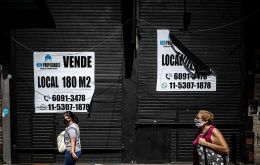 Indec reported that Argentina's GDP grew 12,8% in the third quarter from the previous quarter but overall the economy contracted 10,2% from a year earlier.