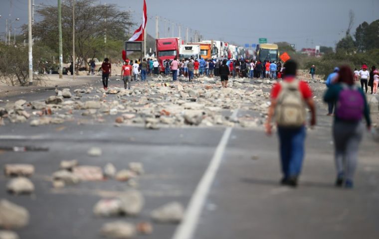 Footage from local television showed hundreds of agricultural workers blocking the Panamerican highway that runs along the coast of the country