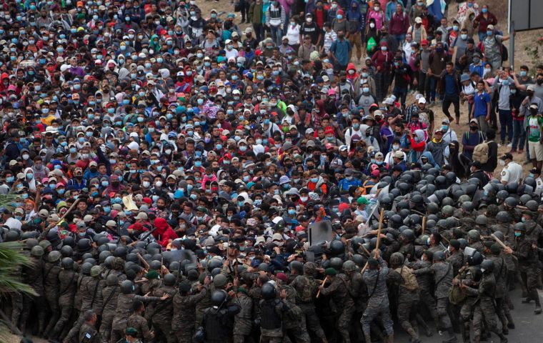 Guatemala said the road in the eastern part of the country reopened to traffic after troops with batons and plastic shields closed in on the migrants 