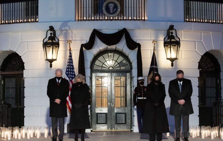 Mr Biden, Vice-President Kamala Harris, first lady Jill Biden and second gentleman Doug Emhoff marked a moment of silence at 6.15pm at the White House after the president’s remarks.(GETTY IMAGES) 