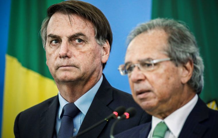 “Paulo Guedes is an anchor for our government,” Bolsonaro said at a ceremony in Brasilia marking the signing into law of central bank autonomy.