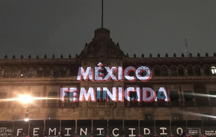 Near the front of the colonial-era presidential building, activists wrote: “Victims of Femicide” in huge letters across the top of the 3-meters barriers
