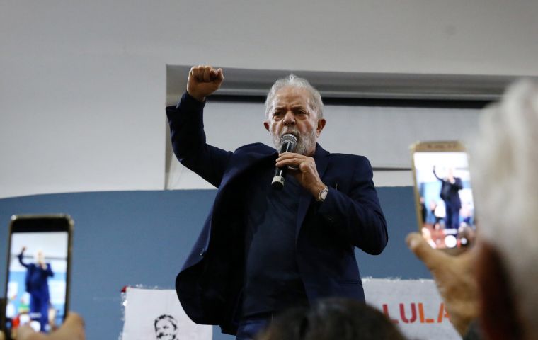 Financial analysts said the prospect of a Lula candidacy would likely drive Bolsonaro to further embrace populist measures to shore up support. (Rahel Patrasso/Reuters)