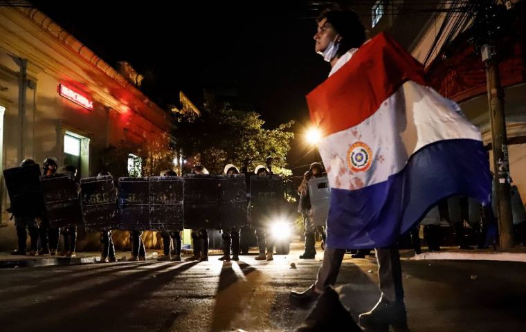The protesters, many wearing soccer jerseys and carrying national flags, chanted “Out Marito” and “Everyone out.” (EFE)