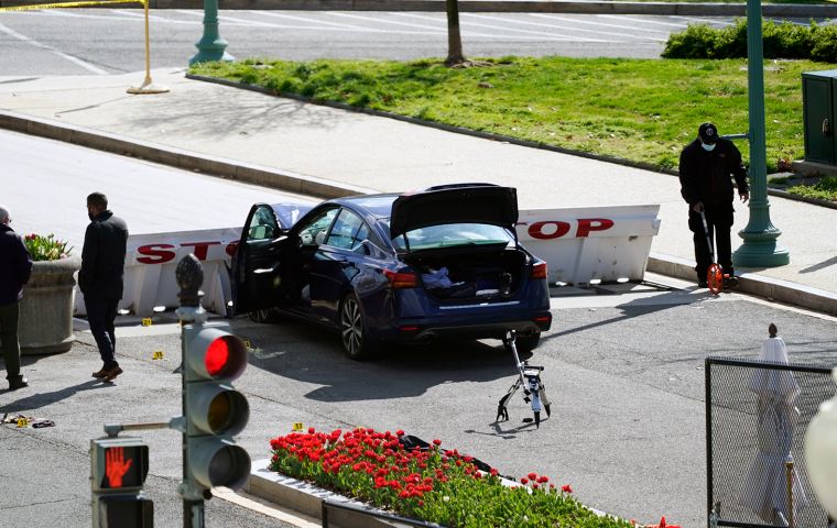 The driver got off the car wielding a knife and was gunned down by law enforcement.