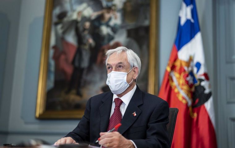 Piñera welcomed the new law to help fight irregular immigration and support legal immigration.