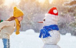 Children took to the streets to build up snowmen for the first and probably the last time of their lives