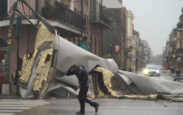 Biden urged people in Louisiana shelters to wear masks and keep their distance