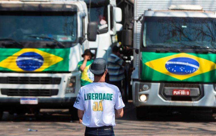 Bolsonaro met with protesters during breaks from a BRICS Summit