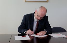 Governor Phillips CBE signs the writ for elections next November