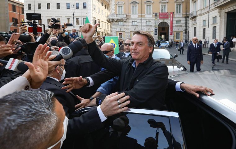 Videos showed bodyguards jostling with journalists, pushing them out of the street while Bolsonaro took selfies and talked to his supporters