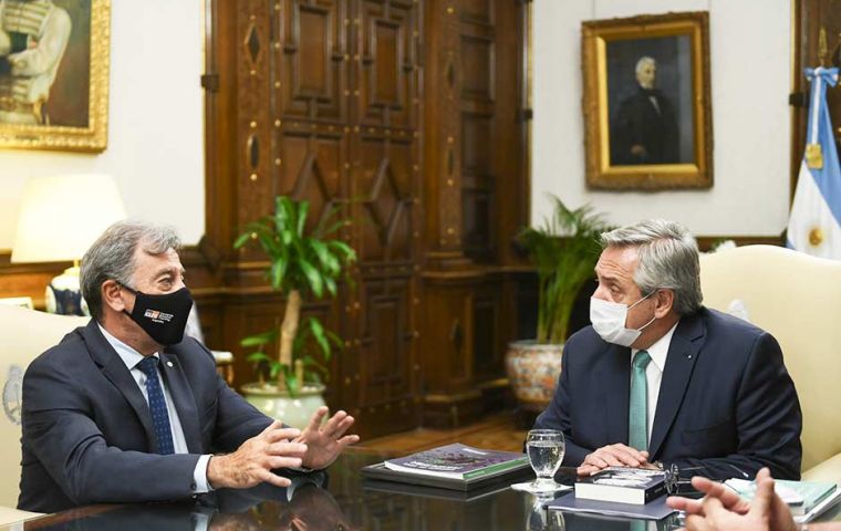 Daniel Herrero with Pte Fernadez. “We continue to grow,” President Alberto  Fernández said 