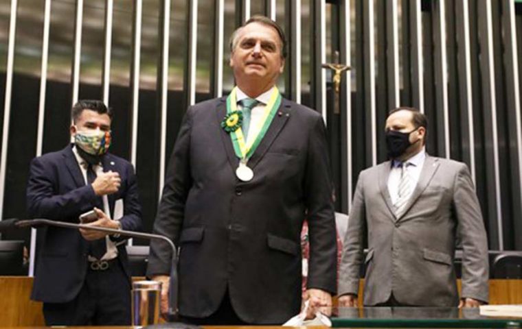 “I hope to interact more and more with all of you,” said Bolsonaro upon receiving his medal 