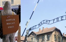 “Impfung macht frei” (vaccination will set you free), paraphrasing Auschwitz's entrance