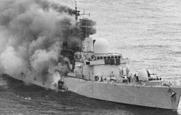 HMS Sheffield burns fiercely in the aftermath of the missile strike.