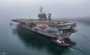 USS Kitty Hawk will have to go all the way down to the tip of South America and back up because it is too big to get through the Panama Canal.