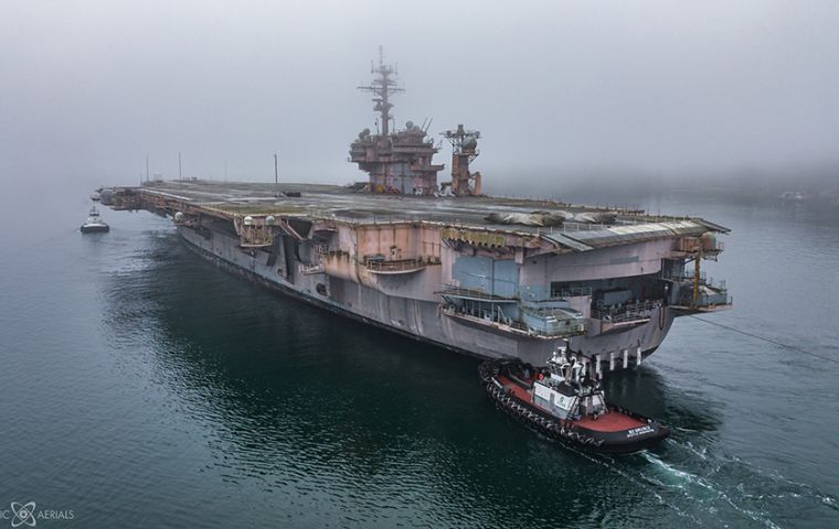 USS Kitty Hawk will have to go all the way down to the tip of South America and back up because it is too big to get through the Panama Canal.