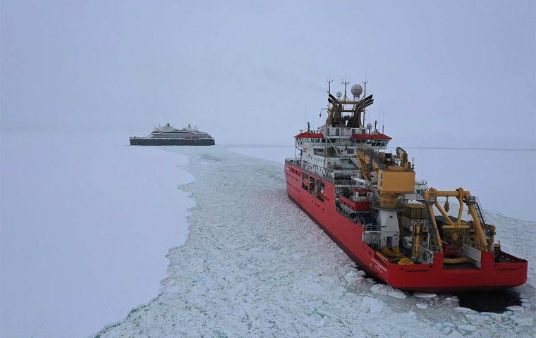 RRS Sir David Attenborough has collaborated with the cruise ship Le Commandant Charcot in its efforts to deliver critical science cargo to the English Coast, Antarctica. Credit: Andrew Fleming, BAS