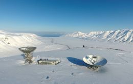 EISCAT Svalbard Radar on a snowy mountain in Svalbard.