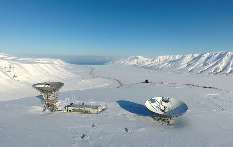 EISCAT Svalbard Radar on a snowy mountain in Svalbard.