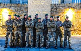 The Royal Marines team that completed the yomp in an impressive two days, at the Liberation Memorial in Stanley (Pic BFSAI)